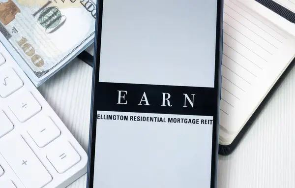 stock image New York, USA - 30 June 2024: Ellington Residential Mortgage Logo on Phone Screen, Company Icon.