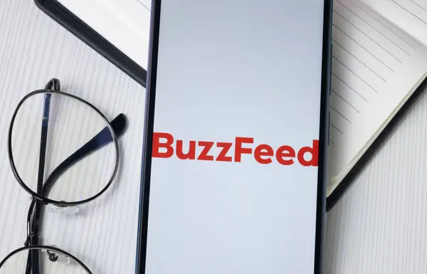 stock image New York, USA - 30 June 2024: BuzzFeed Logo on Phone Screen, Company Icon.