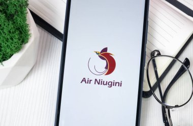 New York, USA - 30 June 2024: Air Niugini Logo on Phone Screen, Company Icon. clipart