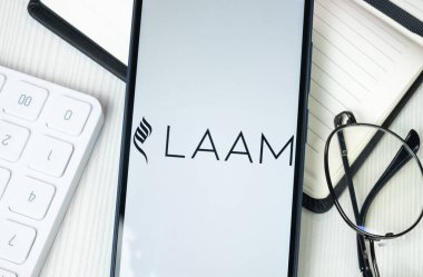 New York, ABD - 30 Haziran 2024: LAAM Logosu Telefon Ekranında, Şirket Simgesi.