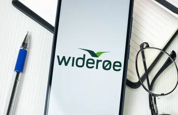 stock image New York, USA - 30 June 2024: Wideroe Logo on Phone Screen, Company Icon.