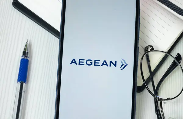 stock image New York, USA - 30 June 2024: Aegean Airlines Logo on Phone Screen, Company Icon.