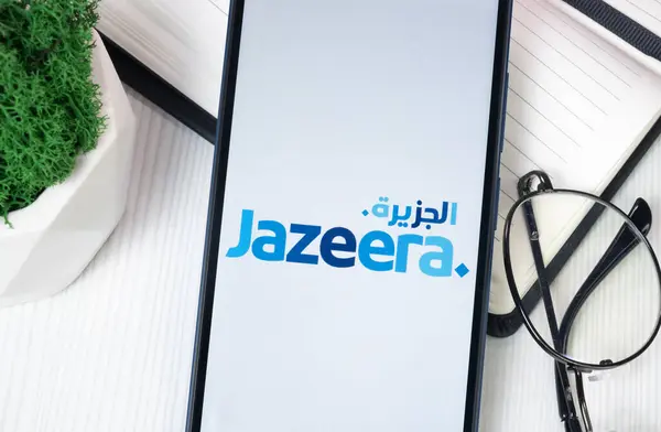 stock image New York, USA - 30 June 2024: Jazeera Airways Logo on Phone Screen, Company Icon.