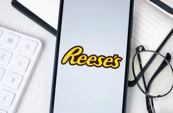 stock image New York, USA - 30 June 2024: Reeses Logo or Icon on Phone Screen.