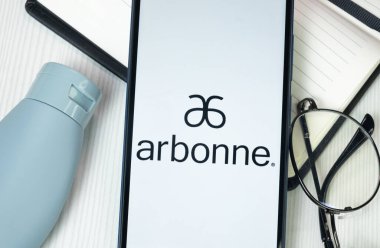 New York, USA - 30 June 2024: Arbonne International Logo on Phone Screen, Company Icon. clipart