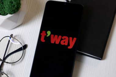 New York, USA - 1 June 2024: Tway Air Logo on Phone Screen, T Way Company Icon. clipart