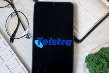 New York, USA - 1 June 2024: Telstra Logo on Phone Screen, Company Icon. clipart