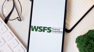 New York, USA - 1 June 2024: WSFS Financial Logo on Phone Screen, Company Icon. clipart