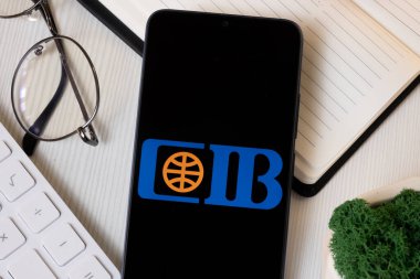 New York, ABD - 1 Haziran 2024: Commercial International Bank Logo on Phone Screen, CIB Company Icon.