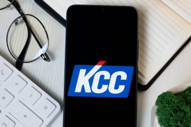 New York, USA - 11 June 2024: KCC Logo on Phone Screen, Company Icon. clipart