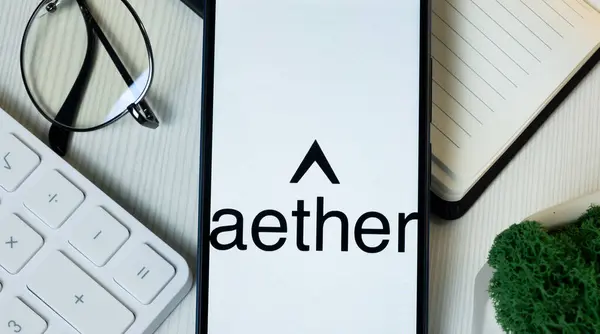 stock image New York, USA - 11 June 2024: Aether Industries Logo on Phone Screen, Company Icon.