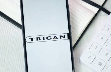 New York, ABD - 30 Haziran 2024: Telefon ekranında Trican Kuyusu Servis Logosu, Şirket Simgesi.