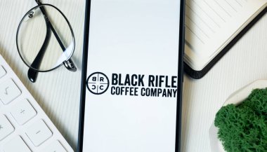 New York, USA - 11 June 2024: Black Rifle Coffee Logo on Phone Screen, BRC Company Icon. clipart