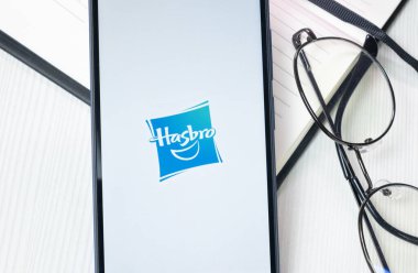 New York, USA - 30 June 2024: Hasbro Logo or Icon on Phone Screen. clipart