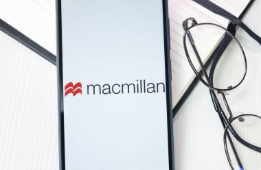 New York, USA - 30 June 2024: Macmillan Publishers Logo or Icon on Phone Screen. clipart