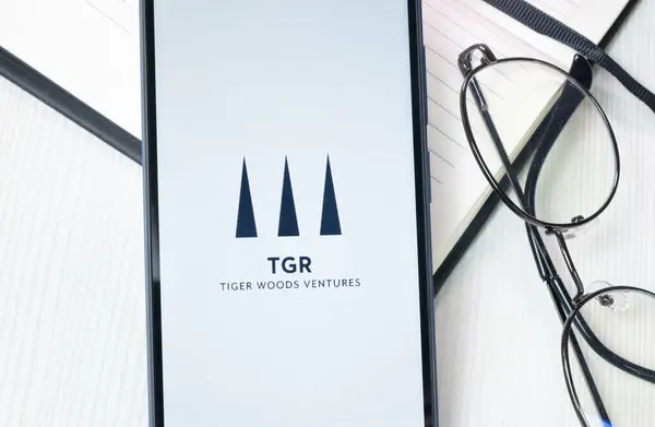 stock image New York, USA - 30 June 2024: Tiger Woods Ventures TGR Logo or Icon on Phone Screen.