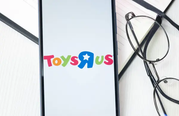 stock image New York, USA - 30 June 2024: Toys R Us ToysRUs Logo or Icon on Phone Screen.