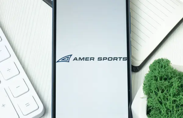 stock image New York, USA - 21 June 2024: Amer Sports Logo on Phone Screen, Company Icon.