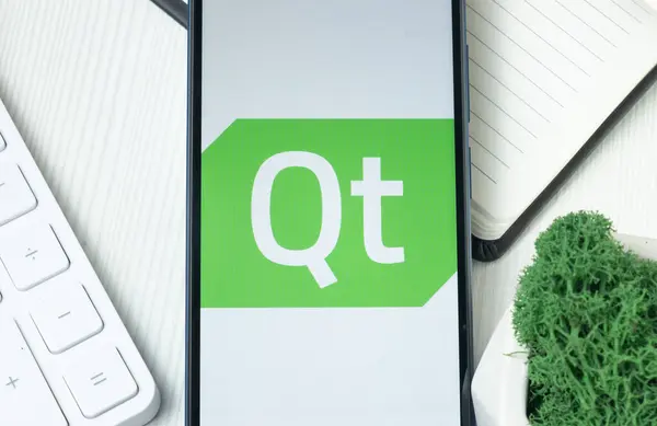 stock image New York, USA - 21 June 2024: Qt Group Logo on Phone Screen, Company Icon.