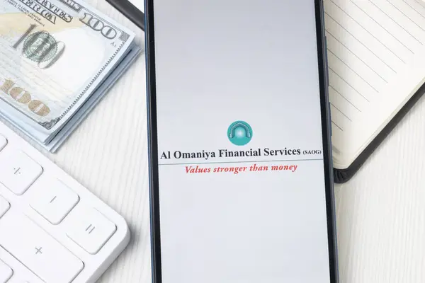 stock image New York, USA - 21 June 2024: Al Omaniya Financial Services Logo on Phone Screen, Company Icon.