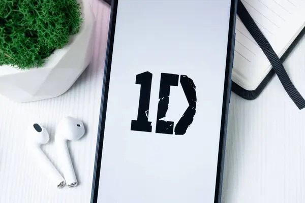 stock image New York, USA - 1 August 2024: 1D Logo on Phone Screen, Music Icon on Display.