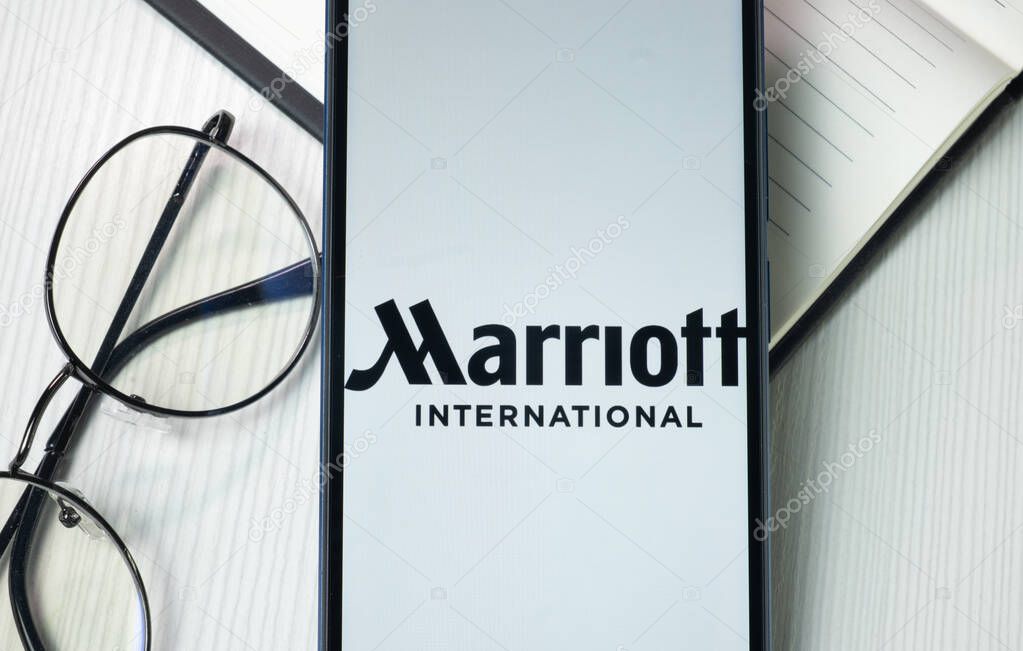 New York, USA - 21 June 2024: Marriott International Logo on Phone Screen, Company Icon.