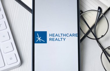 New York, ABD - 21 Haziran 2024: Telefon Ekranında Sağlık Hizmetleri Emlak Logosu, Şirket Simgesi.