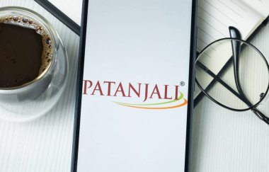 New York, ABD - 21 Haziran 2024: Patanjali Gıda Logosu Telefon Ekranı, Şirket Simgesi.