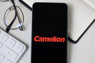 New York, USA - 21 June 2024: Camelion Logo on Phone Screen, Company Icon. clipart