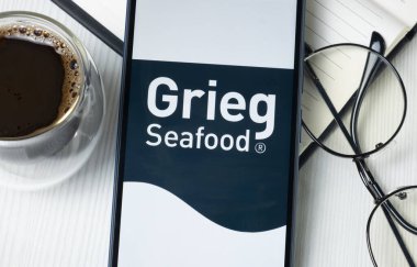 New York, USA - 21 June 2024: Grieg Seafood Logo on Phone Screen, Company Icon. clipart