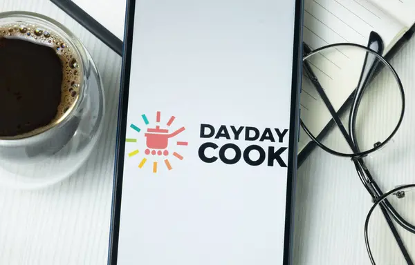 stock image New York, USA - 21 June 2024: DDC Enterprise Logo on Phone Screen, Dayday Cook Company Icon.