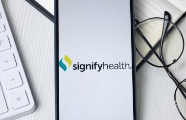 New York, USA - 21 June 2024: Signify Health Logo on Phone Screen, Company Icon. clipart