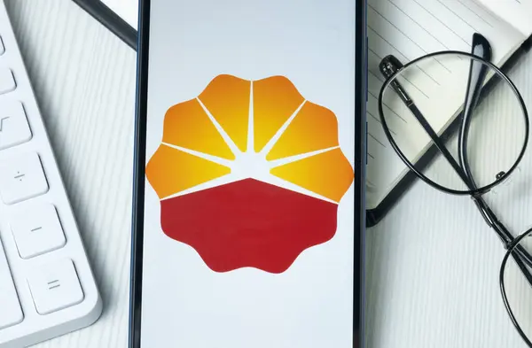 stock image New York, USA - 21 June 2024: Kunlun Energy Logo on Phone Screen, Company Icon.