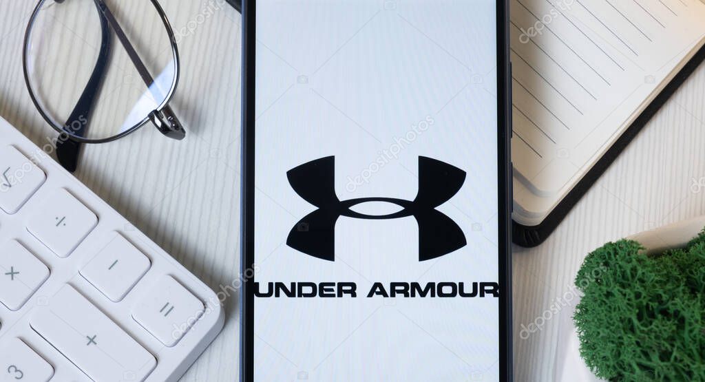 New York, USA - 11 June 2024: Under Armour Logo on Phone Screen, Company Icon.
