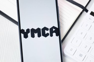 New York, USA - 30 June 2024: YMCA Logo or Icon on Phone Screen. clipart