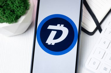 New York, USA - 1 August 2024: Digibyte DGB Logo on Phone Screen, Crypto Coin Icon. clipart