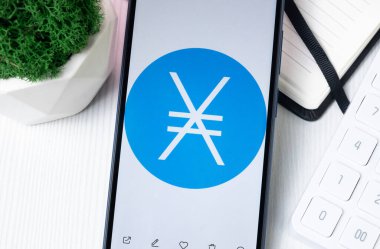 New York, USA - 1 August 2024: Nano XNO Logo on Phone Screen, Crypto Coin Icon. clipart