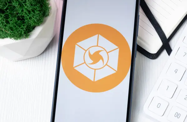 stock image New York, USA - 1 August 2024: Expanse EXP Logo on Phone Screen, Crypto Coin Icon.