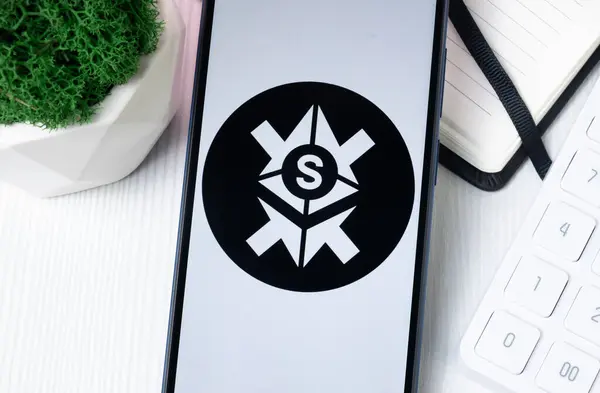 stock image New York, USA - 1 August 2024: Frax Staked Ether sfrxeth Logo on Phone Screen, Crypto Coin Icon.