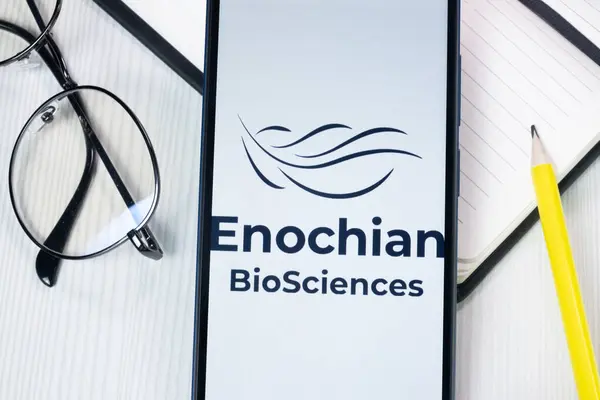 stock image New York, USA - 1 August 2024: Enochian Biosciences Logo on Phone Screen, Company Icon on Display.