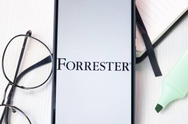 New York, USA - 1 August 2024: Forrester Research Logo on Phone Screen, Company Icon on Display. clipart