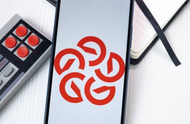 New York, ABD - 1 Ağustos 2024: Uluslararası Logomuz Telefon Ekranında, Şirket Simgesi Ekranda.