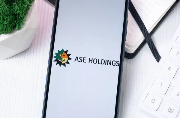 stock image New York, USA - 10 August 2024: ASE Group Logo on Phone Screen, Company Icon on Display.