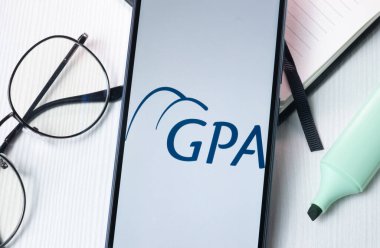 New York, USA - 1 August 2024: GPA Logo on Phone Screen, Company Icon on Display. clipart