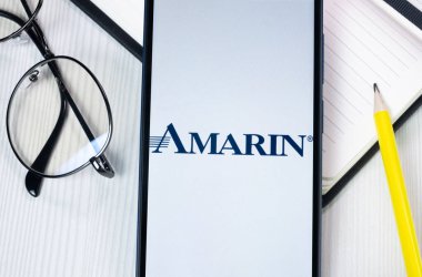 New York, USA - 1 August 2024: Amarin Corporation Logo on Phone Screen, Company Icon on Display. clipart