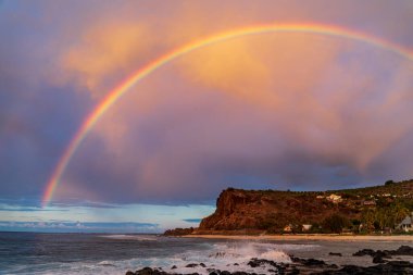 Saint-Gilles, Reunion Island - Rainbow at sunset at Boucan-Canot