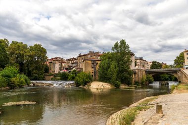 Mont-de-Marsan, France - River Midou crossing the city clipart