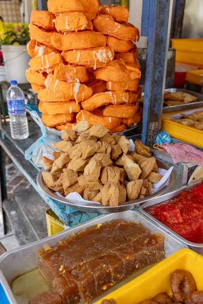 Asian Street Food Stall Variety Snacks Sweets Pile Brown Colored — Stock Photo, Image