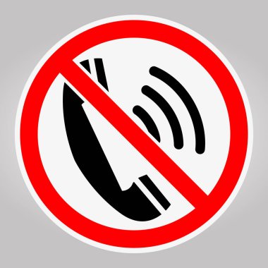 Bu illüstrasyonda kırmızı bir daire ile kalın bir telefon kullanım yasağı tabelası ve bir telefon simgesi üzerinde kesik var. Telefon kullanımına net kısıtlamalar getiriyor..