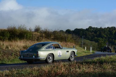 san marino , san marino - sett. 16 -2022 : ASTON MARTIN DB 4 1960 in coppa nuvolari old racing car with classic car